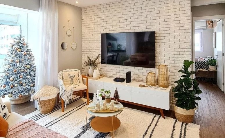 Como poñer a televisión na parede para ter un espazo sofisticado e limpo